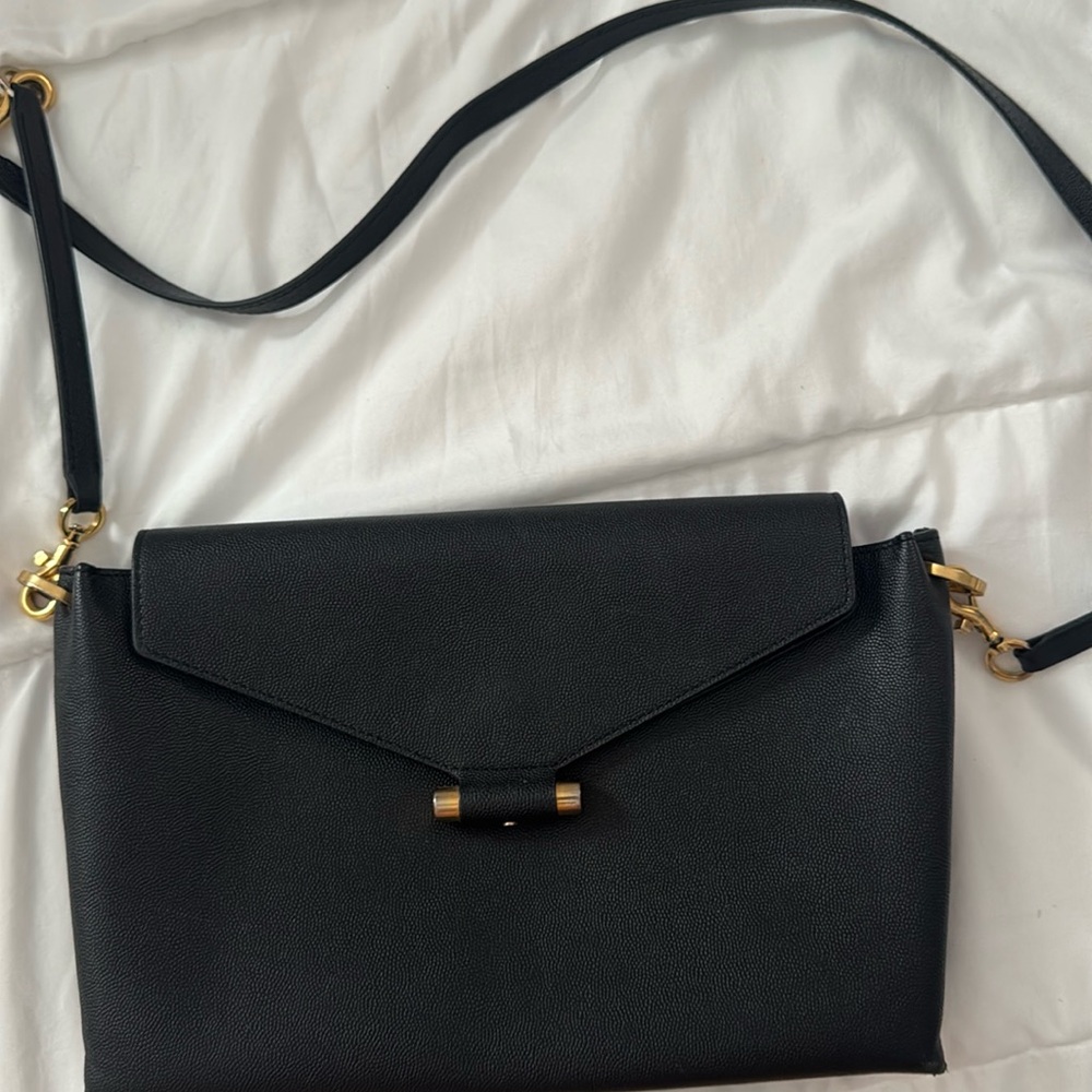 Stuart Weitzmans leather shoulder bag, made in Spain
